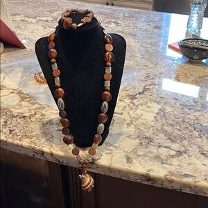 Elegant Beaded Necklace with Brown and Silver Accents
